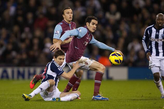 Football - 2012 2013 Premier League - West Bromwich Albion vs. West Ham United West Brom s Zoltan Gera tugs at West Ham s Joey O Brien at The Hawthorns