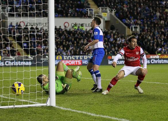 Arsenal s Santi Cazorla celebrates scoring his opening goal Reading v Arsenal - Premier League - Madejski Stadium, Reading- 17 12 12 - Picture David Klein Sportimage EDITORIAL USE ONLY. No use with unauthorised audio, video, data, fixture lists, club league logos or live services. Online in-match use limited to 120 images, no video emulation. No use in betting, games or single club league player publications.