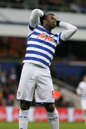 Football - 2012 2013 Premier League - Queens Park Rangers (QPR) vs West Bromwich Albion Djibril Cisse of Queens Park Rangers (QPR) holds his head in his hands after missing an early chance at Loftus Road Stadium