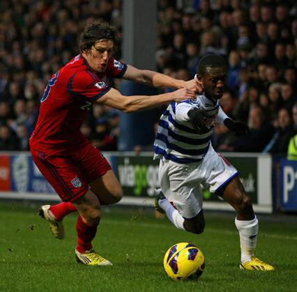 Football - 2012 2013 Premier League - Queens Park Rangers (QPR) vs West Bromwich Albion Billy Jones of West Bromwich Albion tries to stop Shaun Wright-Phillips of Queens Park Rangers (QPR) at Loftus Road Stadium