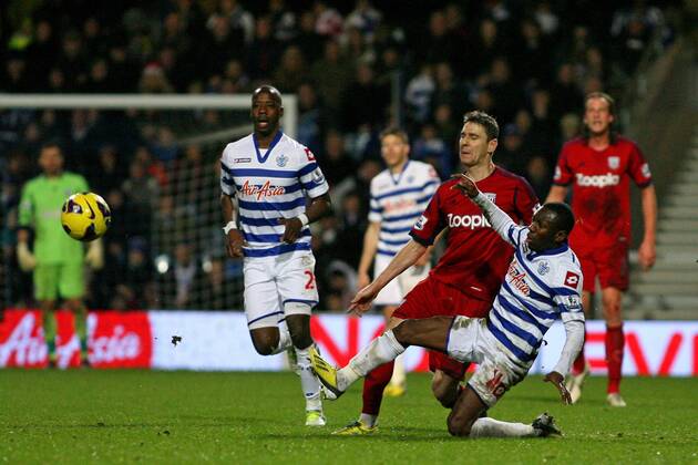Football - 2012 2013 Premier League - Queens Park Rangers (QPR) vs West Bromwich Albion Shaun Wright-Phillips of Queens Park Rangers (QPR) blocks a pass from Zoltan Gera of West Bromwich Albion at Loftus Road Stadium