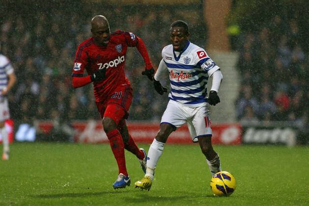 Football - 2012 2013 Premier League - Queens Park Rangers (QPR) vs West Bromwich Albion Shaun Wright-Phillips of Queens Park Rangers (QPR) and Youssouf Mulumbu of West Bromwich Albion in action at Loftus Road Stadium