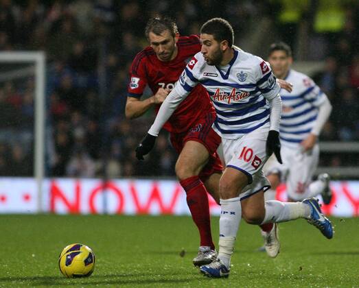 Football - 2012 2013 Premier League - Queens Park Rangers (QPR) vs West Bromwich Albion Adel Taarabt of Queens Park Rangers (QPR) and Gareth McAuley of West Bromwich Albion in action at Loftus Road Stadium