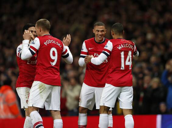Arsenal s Theo Walcott celebrates scoring his sides opening goal with Kieran Gibbs..- Arsenal v Newcastle United - Barclays Premier League - the Emirates Stadium, London- 29 12 12 - Picture David Klein Sportimage EDITORIAL USE ONLY. No use with unauthorised audio, video, data, fixture lists, club league logos or live services. Online in-match use limited to 120 images, no video emulation. No use in betting, games or single club league player publications.
