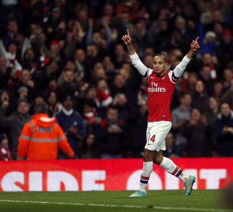 Arsenal s Theo Walcott celebrates scoring his sides fourth goal..- Arsenal v Newcastle United - Barclays Premier League - the Emirates Stadium, London- 29 12 12 - Picture David Klein Sportimage EDITORIAL USE ONLY. No use with unauthorised audio, video, data, fixture lists, club league logos or live services. Online in-match use limited to 120 images, no video emulation. No use in betting, games or single club league player publications.