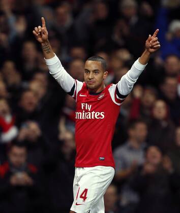 Arsenal s Theo Walcott celebrates scoring his sides fourth goal..- Arsenal v Newcastle United - Barclays Premier League - the Emirates Stadium, London- 29 12 12 - Picture David Klein Sportimage EDITORIAL USE ONLY. No use with unauthorised audio, video, data, fixture lists, club league logos or live services. Online in-match use limited to 120 images, no video emulation. No use in betting, games or single club league player publications.