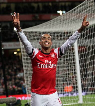 Arsenal s Theo Walcott celebrates scoring his third goal..- Arsenal v Newcastle United - Barclays Premier League - the Emirates Stadium, London- 29 12 12 - Picture David Klein Sportimage EDITORIAL USE ONLY. No use with unauthorised audio, video, data, fixture lists, club league logos or live services. Online in-match use limited to 120 images, no video emulation. No use in betting, games or single club league player publications.