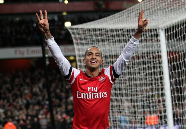 Arsenal s Theo Walcott celebrates scoring his third goal..- Arsenal v Newcastle United - Barclays Premier League - the Emirates Stadium, London- 29 12 12 - Picture David Klein Sportimage EDITORIAL USE ONLY. No use with unauthorised audio, video, data, fixture lists, club league logos or live services. Online in-match use limited to 120 images, no video emulation. No use in betting, games or single club league player publications.