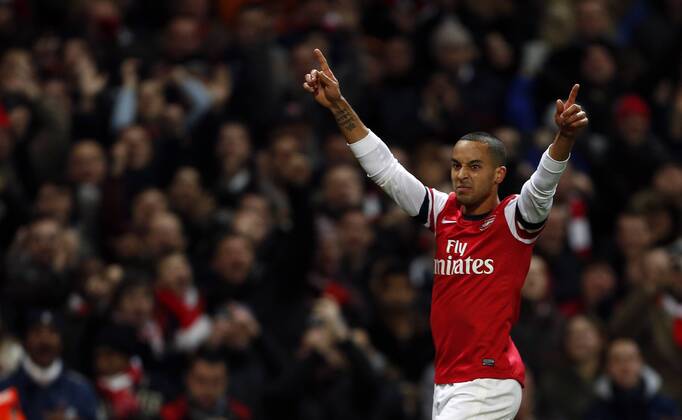 Arsenal s Theo Walcott celebrates scoring his sides fourth goal..- Arsenal v Newcastle United - Barclays Premier League - the Emirates Stadium, London- 29 12 12 - Picture David Klein Sportimage EDITORIAL USE ONLY. No use with unauthorised audio, video, data, fixture lists, club league logos or live services. Online in-match use limited to 120 images, no video emulation. No use in betting, games or single club league player publications.