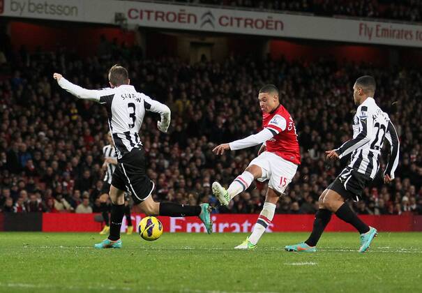 Arsenal s Alex Oxlade-Chamberlain scoring his sides second goal..- Arsenal v Newcastle United - Barclays Premier League - the Emirates Stadium, London- 29 12 12 - Picture David Klein Sportimage EDITORIAL USE ONLY. No use with unauthorised audio, video, data, fixture lists, club league logos or live services. Online in-match use limited to 120 images, no video emulation. No use in betting, games or single club league player publications.
