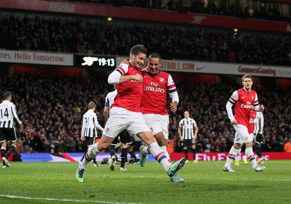 Arsenal s Olivier Giroud celebrates scoring his sides fifth goal with Theo Walcott..- Arsenal v Newcastle United - Barclays Premier League - the Emirates Stadium, London- 29 12 12 - Picture David Klein Sportimage EDITORIAL USE ONLY. No use with unauthorised audio, video, data, fixture lists, club league logos or live services. Online in-match use limited to 120 images, no video emulation. No use in betting, games or single club league player publications.