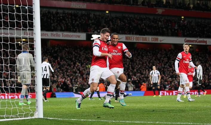 Arsenal s Olivier Giroud celebrates scoring his sides fifth goal with Theo Walcott..- Arsenal v Newcastle United - Barclays Premier League - the Emirates Stadium, London- 29 12 12 - Picture David Klein Sportimage EDITORIAL USE ONLY. No use with unauthorised audio, video, data, fixture lists, club league logos or live services. Online in-match use limited to 120 images, no video emulation. No use in betting, games or single club league player publications.