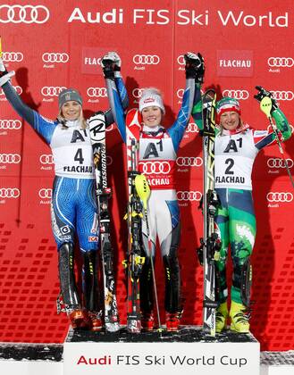 SKI ALPIN - FIS WC Flachau, Slalom, Damen FLACHAU,AUSTRIA,15.JAN.13 - SKI ALPIN - FIS Weltcup, Slalom der Damen, Nachtslalom, Siegerehrung. Bild zeigt den Jubel von Frida Hansdotter (SWE), Mikaela Shiffrin (USA) und Tanja Poutiainen (FIN). 