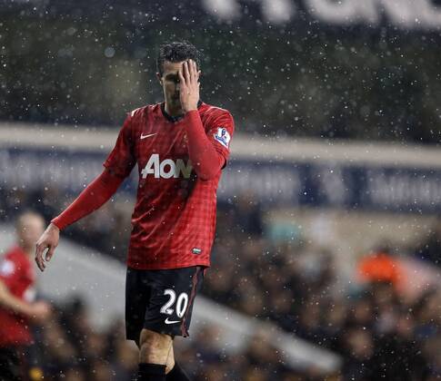 Manchester United ManU s Robin Van Persie looks on dejected..Tottenham Hotspur v Manchester United ManU - Barclays Premier League - White Hart Lane, London- 20 01 13 - Picture David Klein Sportimage EDITORIAL USE ONLY. No use with unauthorised audio, video, data, fixture lists, club league logos or live services. Online in-match use limited to 120 images, no video emulation. No use in betting, games or single club league player publications.