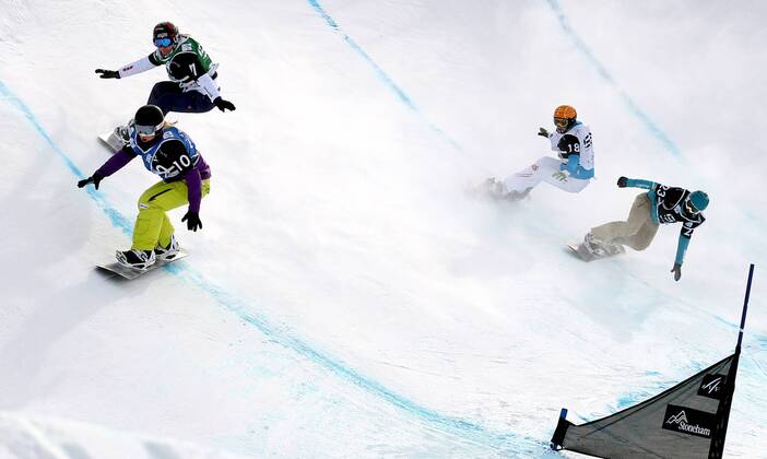 SNOWBOARD - FIS WM Stoneham, SBX, Damen STONEHAM,KANADA,26.JAN.13 - SNOWBOARD - FIS Weltmeisterschaften Stoneham, Boarder Cross, Snowboardcross, Damen. Bild zeigt Sandra Gerber (SUI), Deborah Anthonioz (FRA), Susanne Moll (AUT) und Bell Berghuis (NED). 