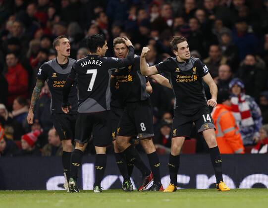 Liverpool s Jordan Henderson celebrates scoring his sides second goal.. - FC Arsenal vs FC Liverpool - Barclays Premier League - Emirates Stadium, London- 30 01 13 - EDITORIAL USE ONLY. No use with unauthorised audio, video, data, fixture lists, club league logos or live services. Online in-match use limited to 120 images, no video emulation. No use in betting, games or single club league player publications.