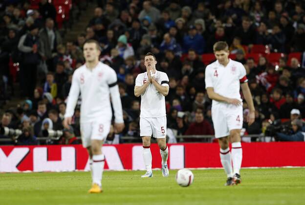 England s Gary Cahill looks on dejected after his mistake led to Brazil s opening goal..England v Brazil - International Friendly - Wembley Stadium, London- 06 02 13 - Picture David Klein Sportimage EDITORIAL USE ONLY. No use with unauthorised audio, video, data, fixture lists, club league logos or live services. Online in-match use limited to 120 images, no video emulation. No use in betting, games or single club league player publications.