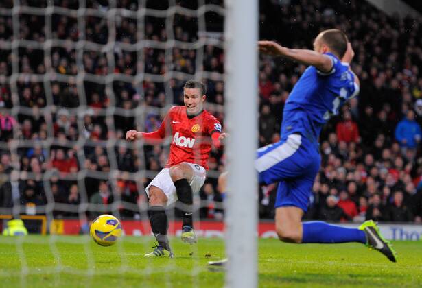 Robin van Persie of Manchester United scores the second goal - Barclays Premier League - Manchester United (ManU) vs. FC Everton - Old Trafford Stadium - Manchester - 10 02 13 - EDITORIAL USE ONLY. No use with unauthorised audio, video, data, fixture lists, club league logos or live services. Online in-match use limited to 120 images, no video emulation. No use in betting, games or single club league player publications.