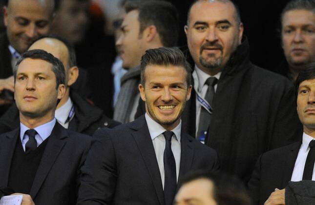 David Beckham of Paris Saint Germain takes his seat in the stands - UEFA Champions League First Knockout Round 1st leg - FC Valencia vs PSG Paris St Germain - Mestalla Stadium - Valencia - - EDITORIAL USE ONLY. No use with unauthorised audio, video, data, fixture lists, club league logos or live services. Online in-match use limited to 120 images, no video emulation. No use in betting, games or single club league player publications.