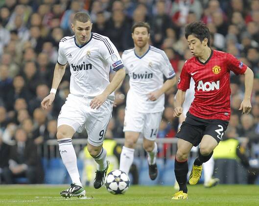 13 2 2013. Soccer match between Real Madrid and Manchester United corresponding to round of 8th first leg of the Champions League, held at the Santiago Bernabeu stadium, in Madrid 2 13 2013. Karim Benzema 