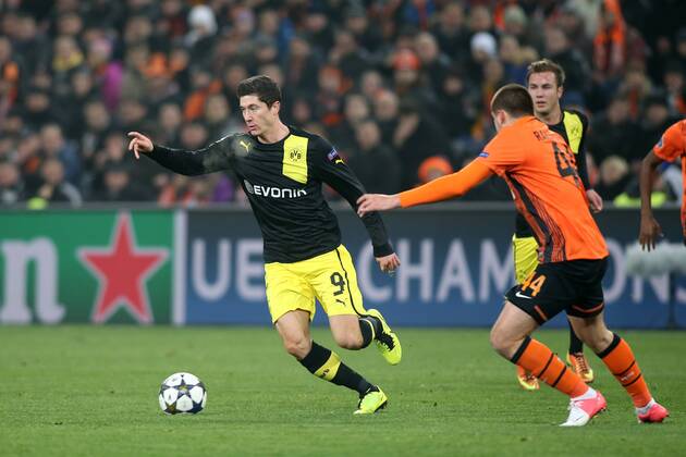 DONIECK 13.02.2013 UEFA CHAMPIONS LEAGUE 1 8FINAL FIRST MATCH: SHAKHTAR DONETSK - BVB Borussia Dortmund: ROBERT LEWANDOWSKI , Yaroslav Rakitskiy 