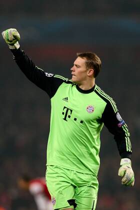 Football - 2012 2013 Champions League - Round of 16, First Leg: Arsenal vs. Bayern Munich Bayern Munich keeper Manuel Neuer celebrates Bayern Munich s Toni Kroos scoring at the Emirates Stadium, London 