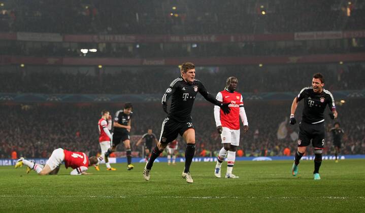 Munich s Toni Kroos celebrates scoring his sides opening goal..Arsenal v Bayern Munich - Champions League Second Round, First Leg- Emirates Stadium, London- 19 02 13 - Picture David Klein Sportimage EDITORIAL USE ONLY. No use with unauthorised audio, video, data, fixture lists, club league logos or live services. Online in-match use limited to 120 images, no video emulation. No use in betting, games or single club league player publications.