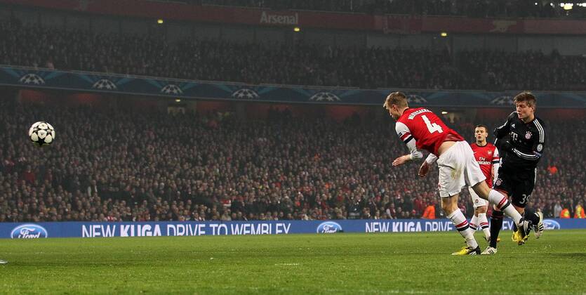 Munich s Toni Kroos scoring his sides opening goal..Arsenal v Bayern Munich - Champions League Second Round, First Leg- Emirates Stadium, London- 19 02 13 - Picture David Klein Sportimage EDITORIAL USE ONLY. No use with unauthorised audio, video, data, fixture lists, club league logos or live services. Online in-match use limited to 120 images, no video emulation. No use in betting, games or single club league player publications.