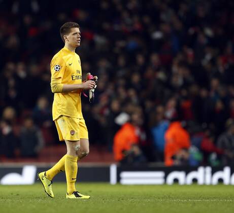 Arsenal s Wojciech Szczesny looks on dejected at the final whistle..Arsenal v Bayern Munich - Champions League Second Round, First Leg- Emirates Stadium, London- 19 02 13 - Picture David Klein Sportimage EDITORIAL USE ONLY. No use with unauthorised audio, video, data, fixture lists, club league logos or live services. Online in-match use limited to 120 images, no video emulation. No use in betting, games or single club league player publications.