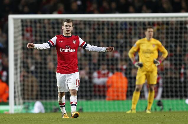 Arsenal s Jack Wilshere looks on dejected after going 3-1 down..Arsenal v Bayern Munich - Champions League Second Round, First Leg- Emirates Stadium, London- 19 02 13 - Picture David Klein Sportimage EDITORIAL USE ONLY. No use with unauthorised audio, video, data, fixture lists, club league logos or live services. Online in-match use limited to 120 images, no video emulation. No use in betting, games or single club league player publications.