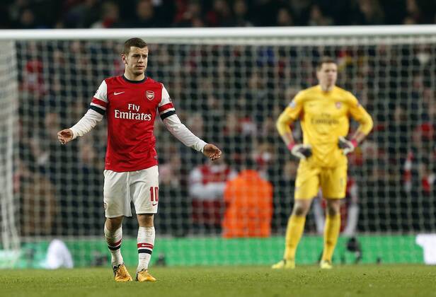 Arsenal s Jack Wilshere looks on dejected after going 3-1 down..Arsenal v Bayern Munich - Champions League Second Round, First Leg- Emirates Stadium, London- 19 02 13 - Picture David Klein Sportimage EDITORIAL USE ONLY. No use with unauthorised audio, video, data, fixture lists, club league logos or live services. Online in-match use limited to 120 images, no video emulation. No use in betting, games or single club league player publications.