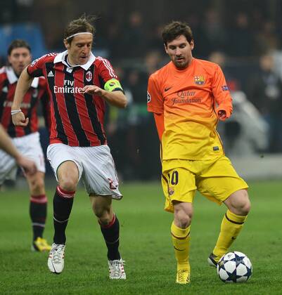Massimo Ambrosini Milan, Lionel Messi Barcelona.Milano 20 02 2013 Stadio San Siro - Giuseppe Meazza.Football Calcio 2012 2013 Champions League. AC Milan vs. FC Barcelona -- andreaxstaccioli