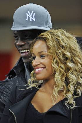 Milano 20 02 2013 - Champions League AC Milan - FC Barcelona -- Mario Balotelli and girlfriend Fanny Neguesha 
