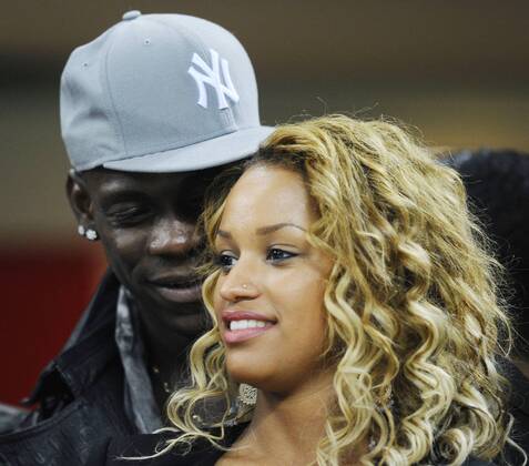 Milano 20 02 2013 - Champions League AC Milan - FC Barcelona -- Mario Balotelli and girlfriend Fanny Neguesha 