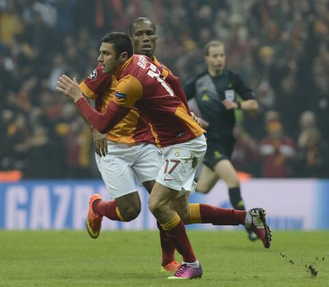 UEFA Champions League last sixteen first leg match between Galatasaray and Schalke 04 at Turk Telekom Arena Stadium in Istanbul on 20.02.2013 Pictured: Burak Yilmaz and Didier Drogba of Galatasaray. 