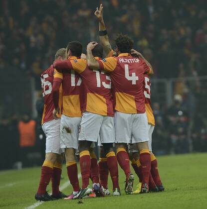 UEFA Champions League last sixteen first leg match between Galatasaray and Schalke 04 at Turk Telekom Arena Stadium in Istanbul on 20.02.2013 Pictured: Galatasaray s players celebrates after the score. 