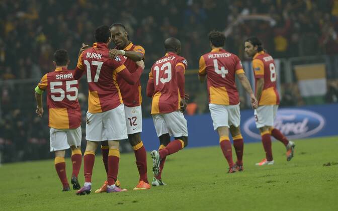 UEFA Champions League last sixteen first leg match between Galatasaray and Schalke 04 at Turk Telekom Arena Stadium in Istanbul on 20.02.2013 Pictured: Galatasaray s players celebrates after the score. 