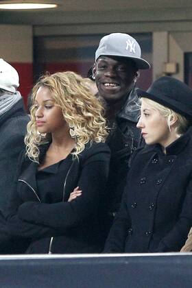 Mario Balotelli and girlfriend Fanny Neguesha - 20 02 2013 Stadio S.Siro Football Calcio UEFA Champions League 2012 13 Milan vs Barcelona PaoloxNucci