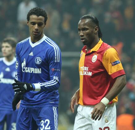 UEFA Champions League last sixteen first leg match between Galatasaray and Schalke 04 at Turk Telekom Arena Stadium in Istanbul on 20.02.2013 Pictured: Didier Drogba of Galatasaray and Joel Matip of Schalke 04. 