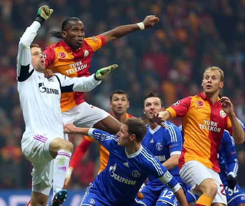 UEFA Champions League last sixteen first leg match between Galatasaray and Schalke 04 at Turk Telekom Arena Stadium in Istanbul on 20.02.2013 Pictured: Didier Drogba of Galatasaray and Goalkeeper Timo Hildebrand of Schalke 04. 