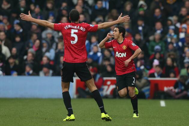 Football - 2012 2013 Premier League - Queens Park Rangers vs. Manchester United (ManU) Manchester United (ManU) s Rafael celebrates scoring by sucking his thumb with Manchester United (ManU) s Rio Ferdinand at Loftus Road, London