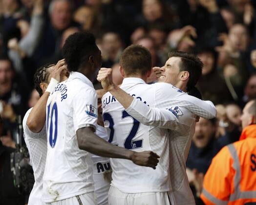 Tottenham s Gareth Bale celebrates scoring his sides opening goal..Tottenham Hotspur v Arsenal- Barclays Premier League - White Hart Lane, London- 3 03 13 - Picture David Klein Sportimage EDITORIAL USE ONLY. No use with unauthorised audio, video, data, fixture lists, club league logos or live services. Online in-match use limited to 120 images, no video emulation. No use in betting, games or single club league player publications.
