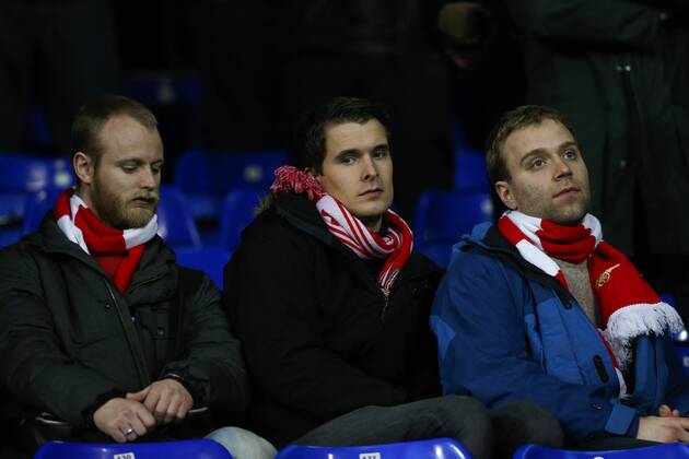 Football - 2012 2013 Premier League - Arsenal FC London Dejected Arsenal fans after the match at White Hart Lane, London