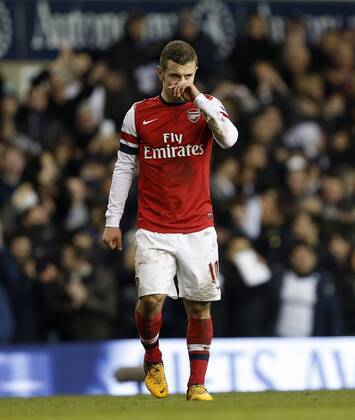 Arsenal s Jack Wilshere looks on dejected..Tottenham Hotspur v Arsenal- Barclays Premier League - White Hart Lane, London- 3 03 13 - Picture David Klein Sportimage EDITORIAL USE ONLY. No use with unauthorised audio, video, data, fixture lists, club league logos or live services. Online in-match use limited to 120 images, no video emulation. No use in betting, games or single club league player publications.