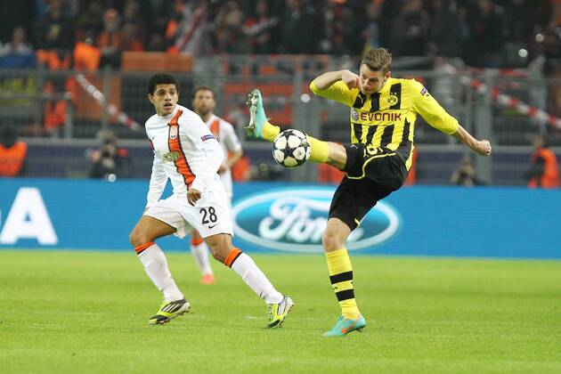 Lukasz PISZCZEK (Borussia Dortmund) im Zweikampf mit TAISON (FC Shakhtar Donetsk), Aktion Action 05.03.2013, GER, Fussball, UEFA Champions League, Achtelfinale, Saison 2012 2013, Borussia Dortmund vs FC Shakhtar Donetsk