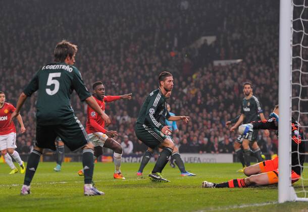 Sergio Ramos of Real Madrid heads past Diego Lopez of Real Madrid to score an own goal - UEFA CHAMPIONS LEAGUE - ROUND OF 16 - Manchester Utd vs Real Madrid - Old Trafford Stadium - Manchester - 05 03 13 - Picture Simon Bellis Sportimage- EDITORIAL USE ONLY. No use with unauthorised audio, video, data, fixture lists, club league logos or live services. Online in-match use limited to 120 images, no video emulation. No use in betting, games or single club league player publications.