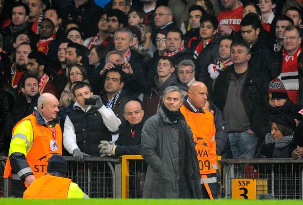 Jose Mourinho manager of Real Madrid looks back as he walks along the touchline before the final whistle - UEFA CHAMPIONS LEAGUE - ROUND OF 16 - Manchester Utd vs Real Madrid - Old Trafford Stadium - Manchester - 05 03 13 - Picture Simon Bellis Sportimage- EDITORIAL USE ONLY. No use with unauthorised audio, video, data, fixture lists, club league logos or live services. Online in-match use limited to 120 images, no video emulation. No use in betting, games or single club league player publications.