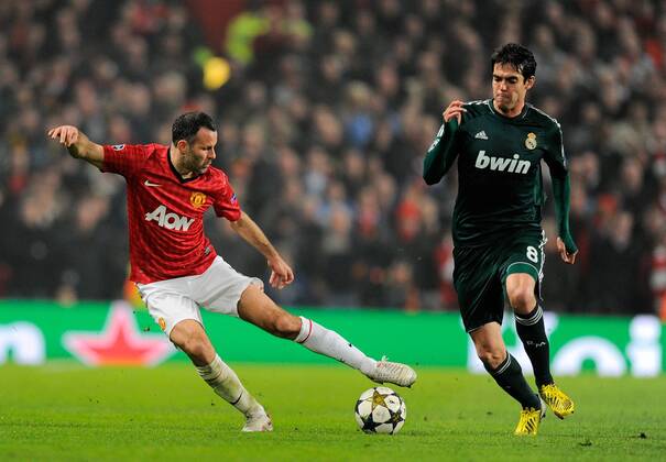 Ryan Giggs of Manchester United and Kaka of Real Madrid - UEFA CHAMPIONS LEAGUE - ROUND OF 16 - Manchester Utd vs Real Madrid - Old Trafford Stadium - Manchester - 05 03 13 - Picture Simon Bellis Sportimage- EDITORIAL USE ONLY. No use with unauthorised audio, video, data, fixture lists, club league logos or live services. Online in-match use limited to 120 images, no video emulation. No use in betting, games or single club league player publications.
