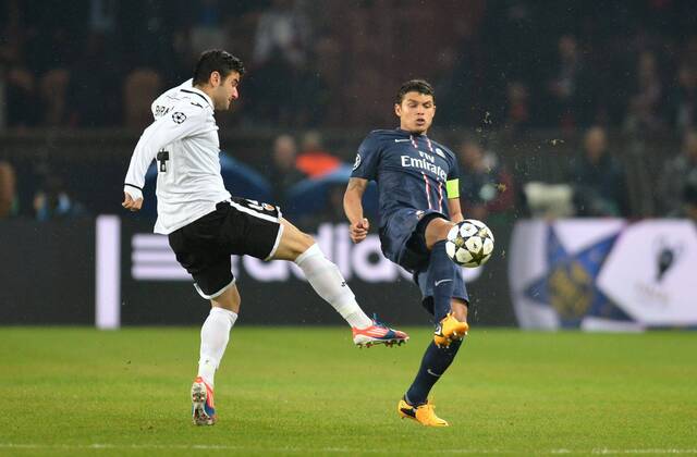 Thiago Silva (psg) - Antonio Barragan (val) FOOTBALL : Paris SG vs Valence - Ligue des champions - 06 03 2013 AnthonyBIBARD FEP Panoramic 