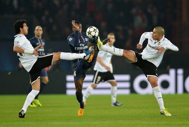 Blaise Matuidi (psg) - Daniel Parejo (val) - Sofiane Feghouli (val) FOOTBALL : Paris SG vs Valence - Ligue des champions - 06 03 2013 AnthonyBIBARD FEP Panoramic 